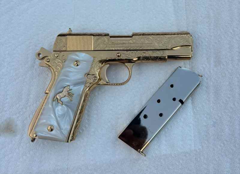 New. Custom hand engraved Colt. 45acp 