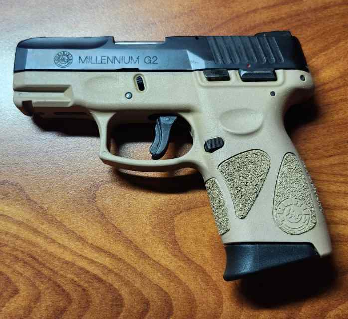 Taurus Millenium G2 PT111 9mm two tone